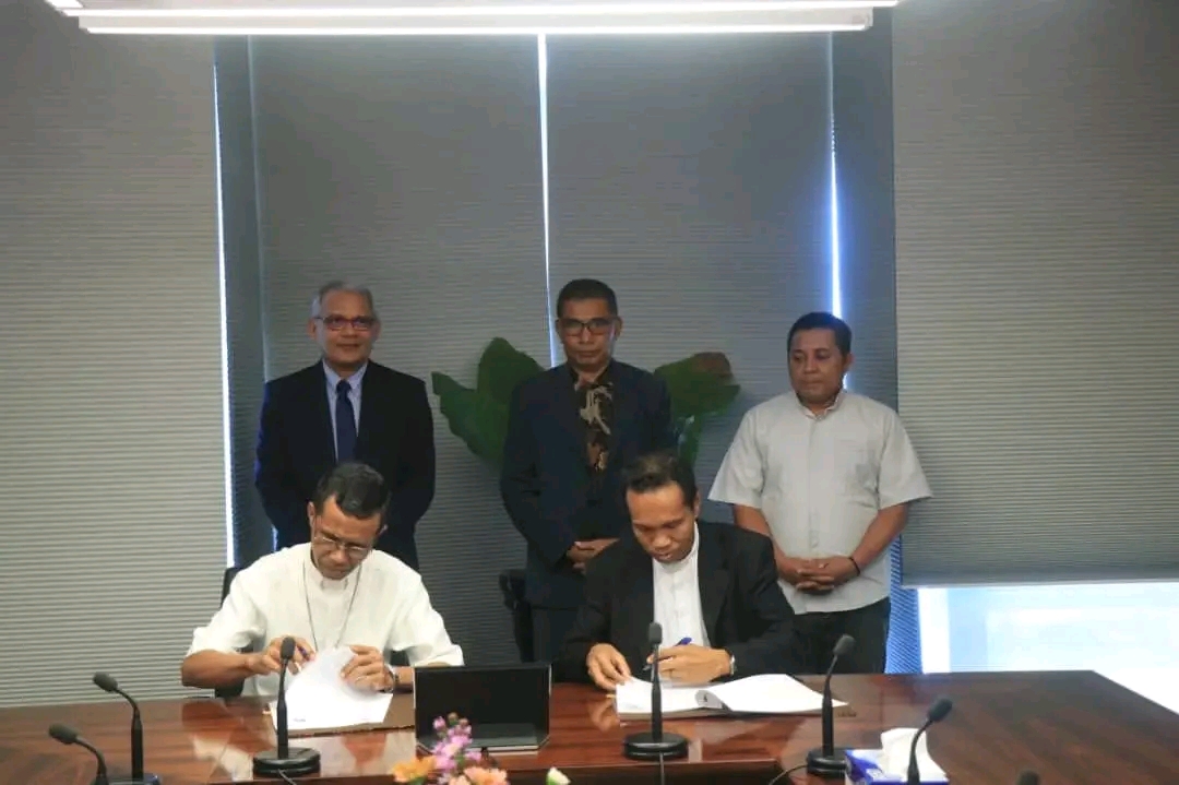 Asina Akordu entre Diosese Baucau ho Ministru Finansas ba Konstrusaun Parókia Sao Paulo Lospalos